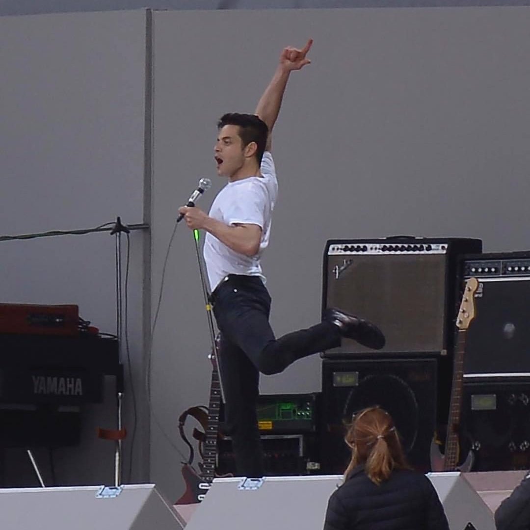 queenxstan's tweet image. i'm so in love with these pictures of rami on the set of borhap, god look at him