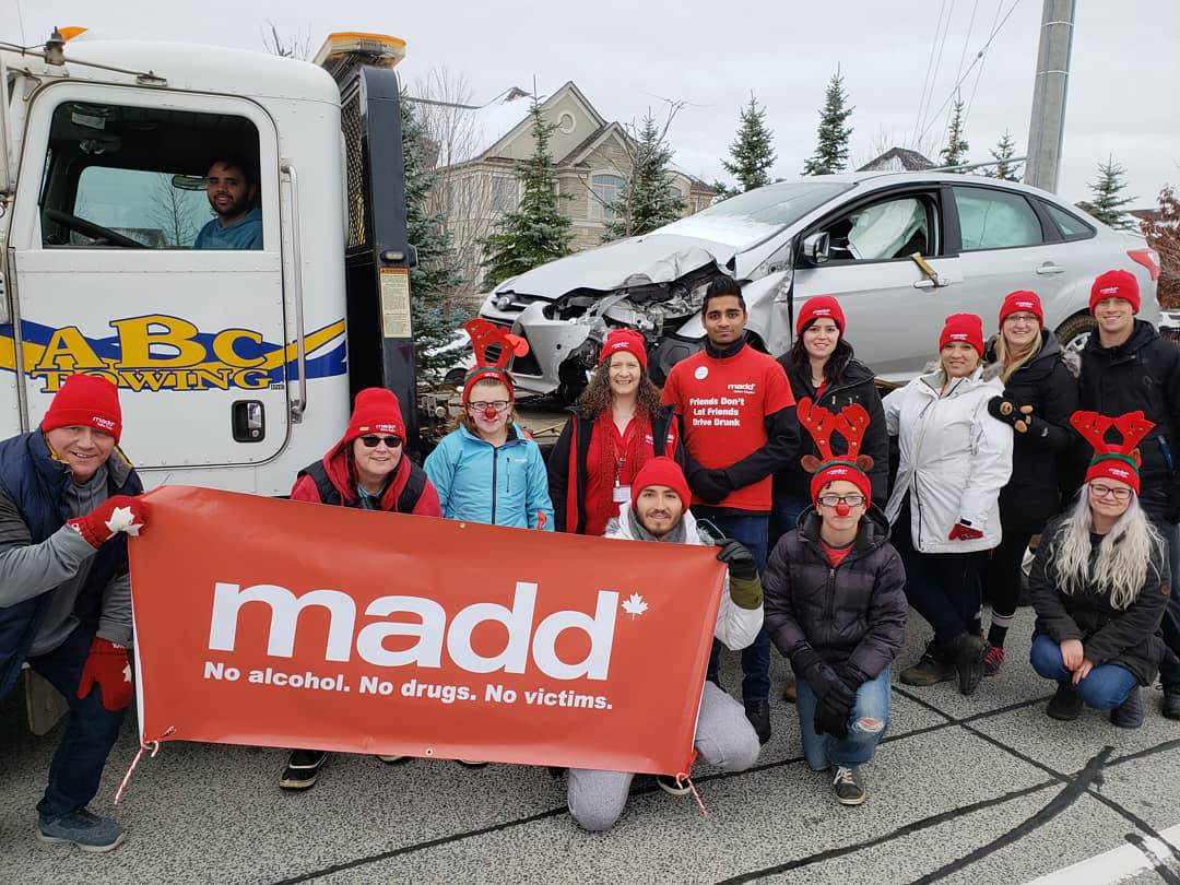 MaddHalton's tweet photo. Group photo from today's parade! Thank you to everyone who came out and to all our wonderful volunteers! #abctowing #haltonregionalpolice #maddhalton #stopimpaireddriving https://t.co/DsW6d60FH8