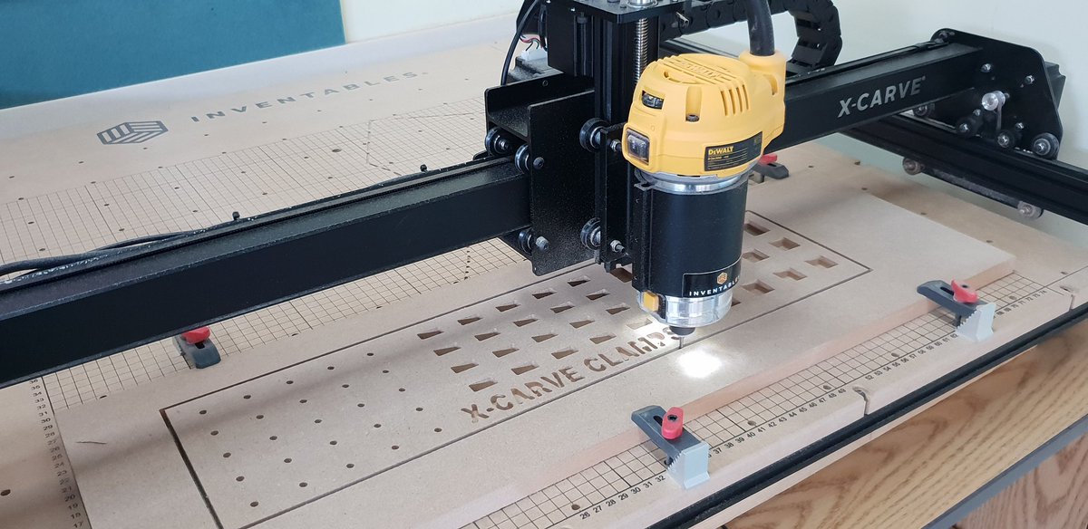 mmcewen17's tweet photo. My son Sean helped me get the new Xcarve fired up in the #tksdesign hub. Dialed it in on the first cut and then designed a clamp holder after the laser cut box just did not feel right. https://t.co/nVrpxrzcms