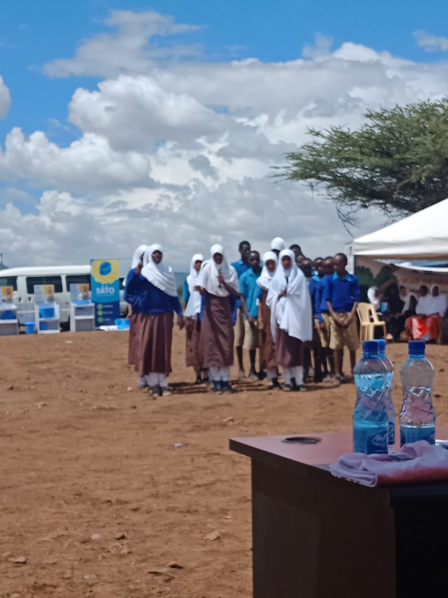 Mackenah's tweet photo. "Choo kifaa muhumu tukidhamini" a message from pupils during the WTD celebrations in Isiolo County Kenya. #WorldToiletDay @WASHallianceKe https://t.co/AuXOZZ02SI