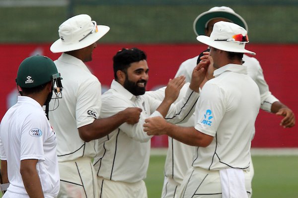 BLACKCAPS's tweet photo. HE'S DONE IT! Ajaz Patel has FIVE on debut and we've won by FOUR runs in Abu Dhabi. 175 defended in the opening match of the series. Azhar Ali out LBW for 65. SCENES. Scorecard | https://t.co/vvhGBsYknh #PAKvNZ 📷= @PhotosportNZ https://t.co/ztF0z0Bfyh
