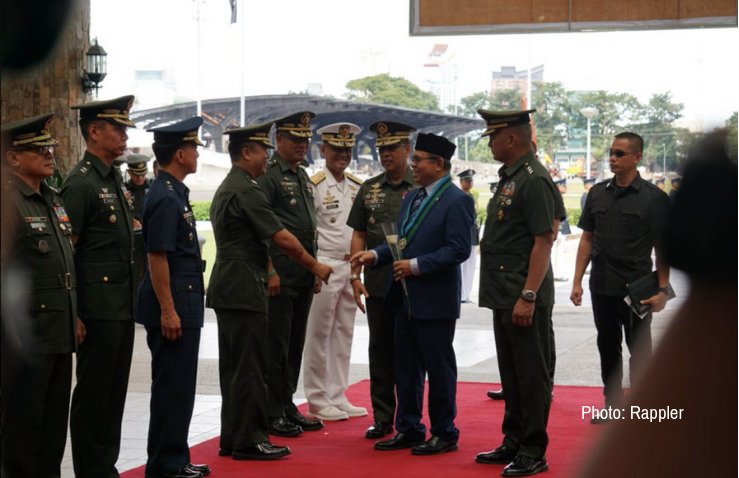 KusogMindanaw's tweet photo. The visit of Moro Islamic Liberation Front (MILF) chair Al-Hajj Murad  Ebrahim in Camp Aguinaldo, Quezon City on Monday will further cement the  group's trust in the government and military https://t.co/owunN8XSCf https://t.co/GMketKMPMB