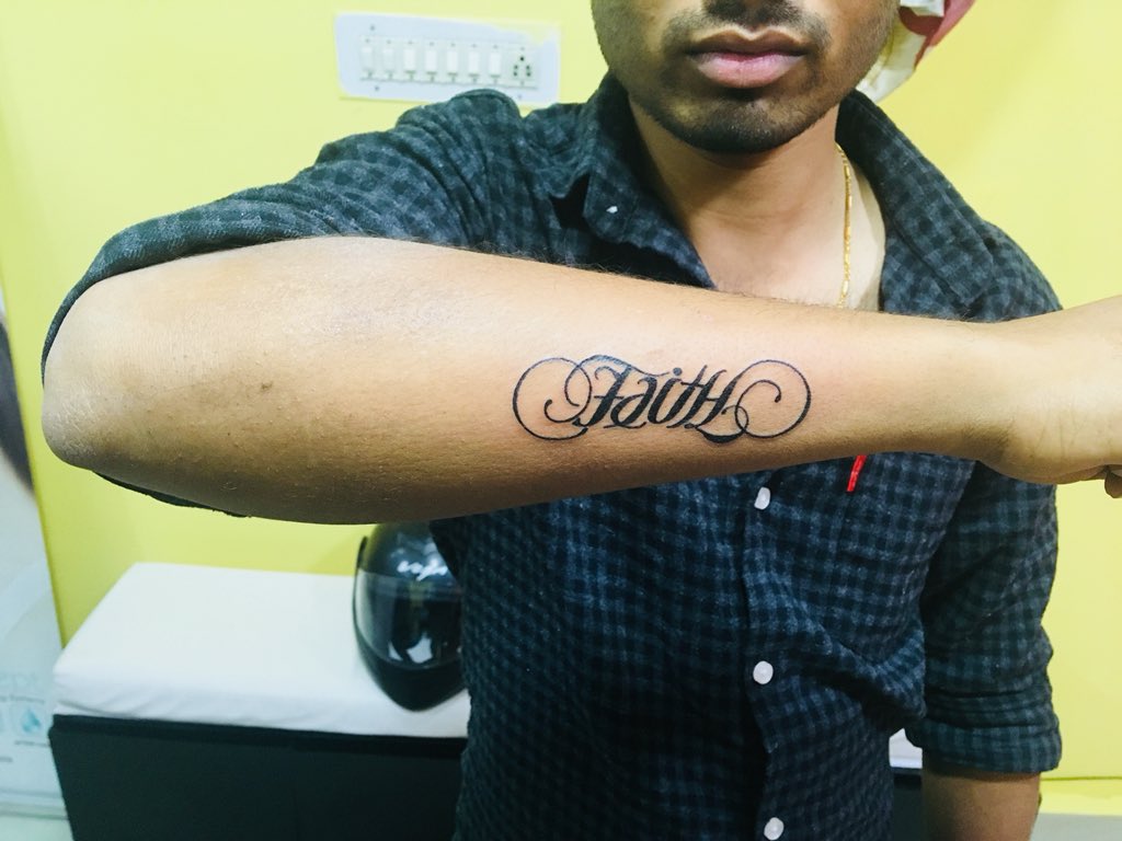 Wrist tattoo saying Hope on Crystelle