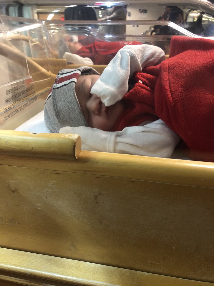 OSUWexMed's tweet photo. Our newest members of #BuckeyeNation are suiting up for the game this weekend! All #BuckeyeBabies born at #OSUWexMed this week (through 11/24) will receive “Beat ❌ichigan” sleep swaddles and Buckeye helmet-inspired hats. #GoBucks 👶🏼 https://t.co/SFSu8bEysN