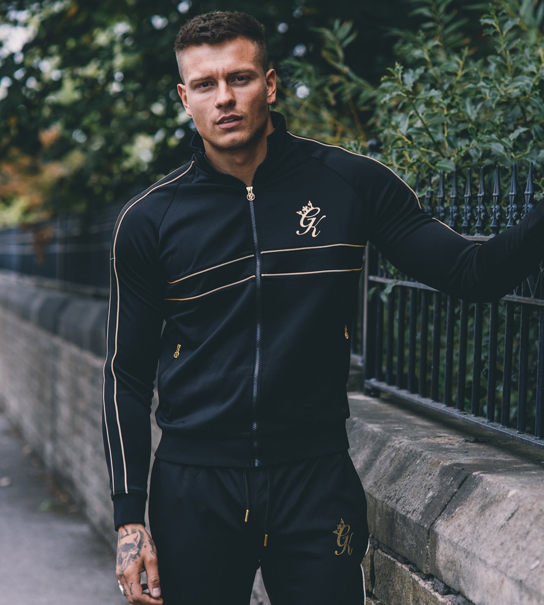 gym king black and gold tracksuit