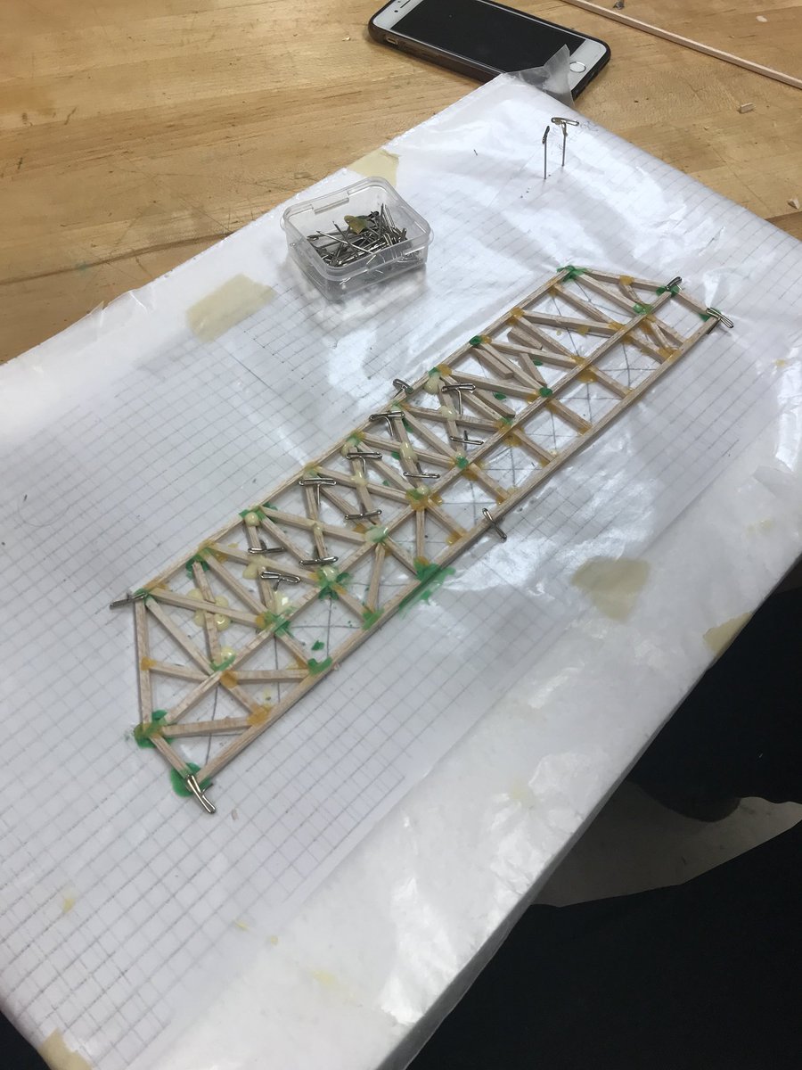 MrWolfTech's tweet image. Building bridges! These 8th graders are doing pretty well. Let’s hope these bridges can break the school weight record of 22.6 lbs! #EWStrong