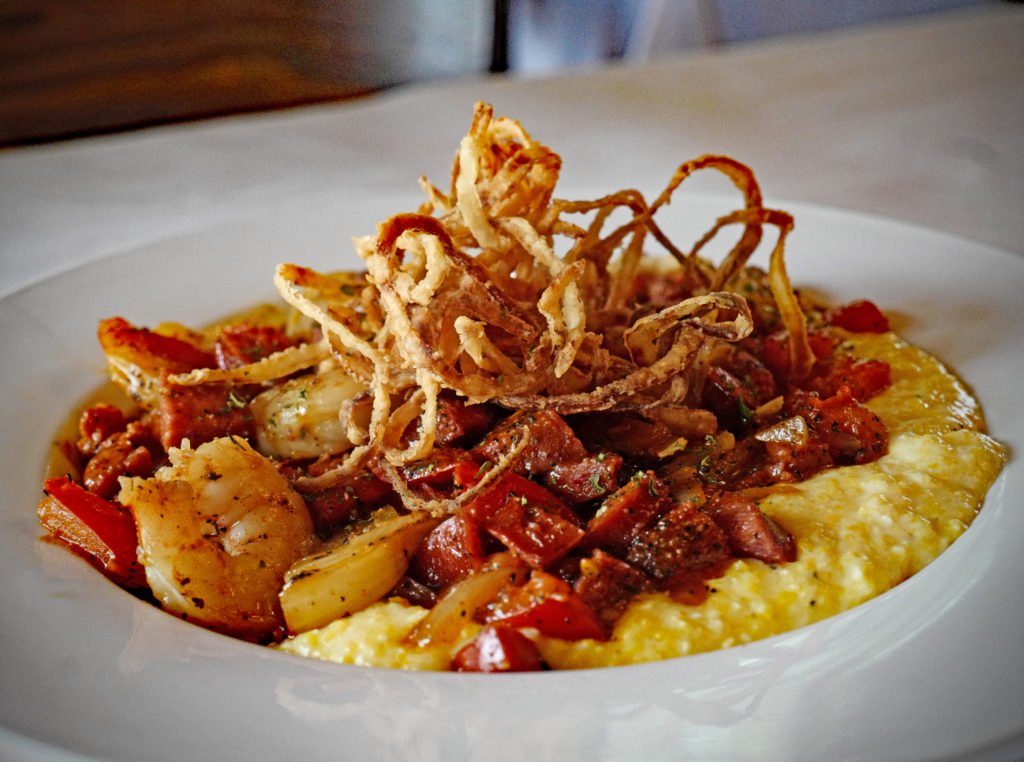 Roadfood123's tweet photo. Old Edgefield Grill | Edgefield, SC | https://t.co/w3ItVCA72k | Andouille sausage and Cajun wine/butter sauce make shrimp &amp; grits sparkle. https://t.co/milcIMg264