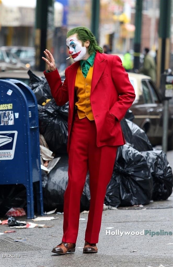 Joaquin Phoenix All Smiles As The Joker In Action Tmzcom