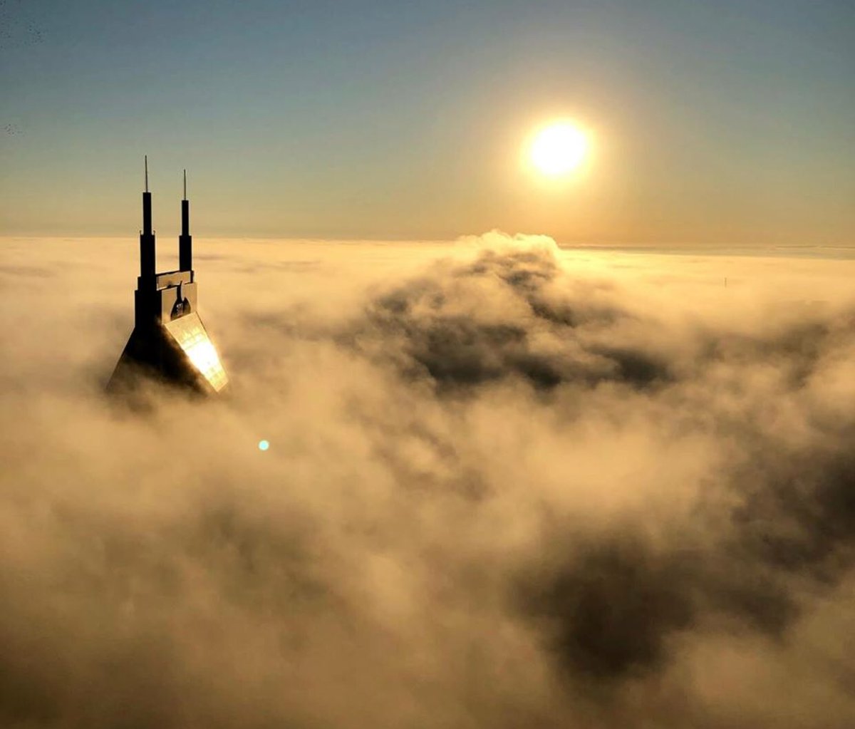 DavidSEwing's tweet photo. View high above the clouds on a recent foggy morning taken by Mark Stengel from his place 505. @505Nashville @ATT #505nashville #batmanbuilding https://t.co/10oZWBJUaV