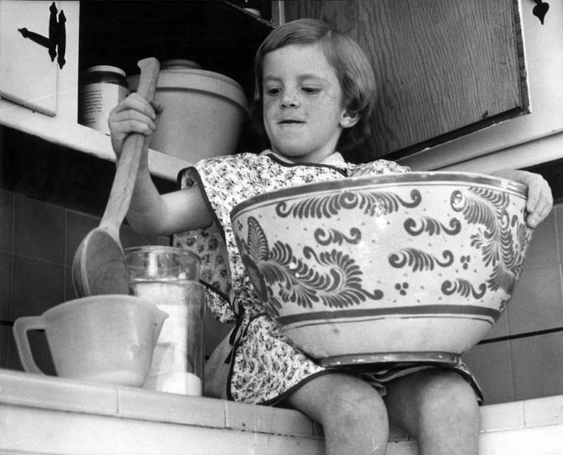 girl cooking with big bowl