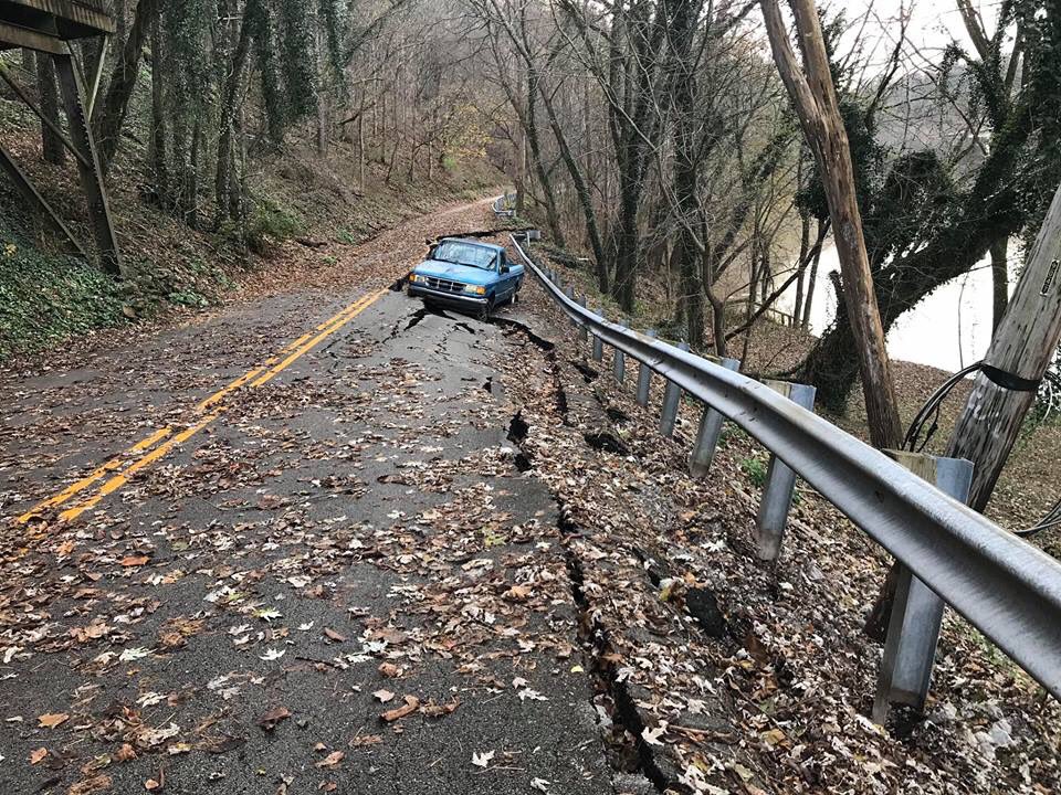 KYTCDistrict5's tweet photo. "Road closed" signs are posted for a reason. Don't put yourself in this position. Obey traffic control signs. This embankment slide on KY 1263 (Big Eddy Rd) in Franklin Co happened in early Nov. No timetable yet on reopening as repair contractor is working on other slides in KY. https://t.co/ZfnhNlXCy9
