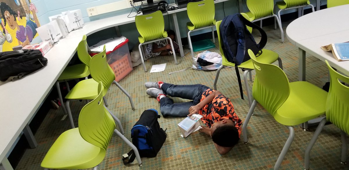 smmcfate's tweet image. There are 3 students reading in this corner of the @STEAMatOakdale library-media center. Can you find them all?? #BattleOfTheBooks #RHSDLibraries #ThankfulForSchoolLibraries #MyRockHillStory