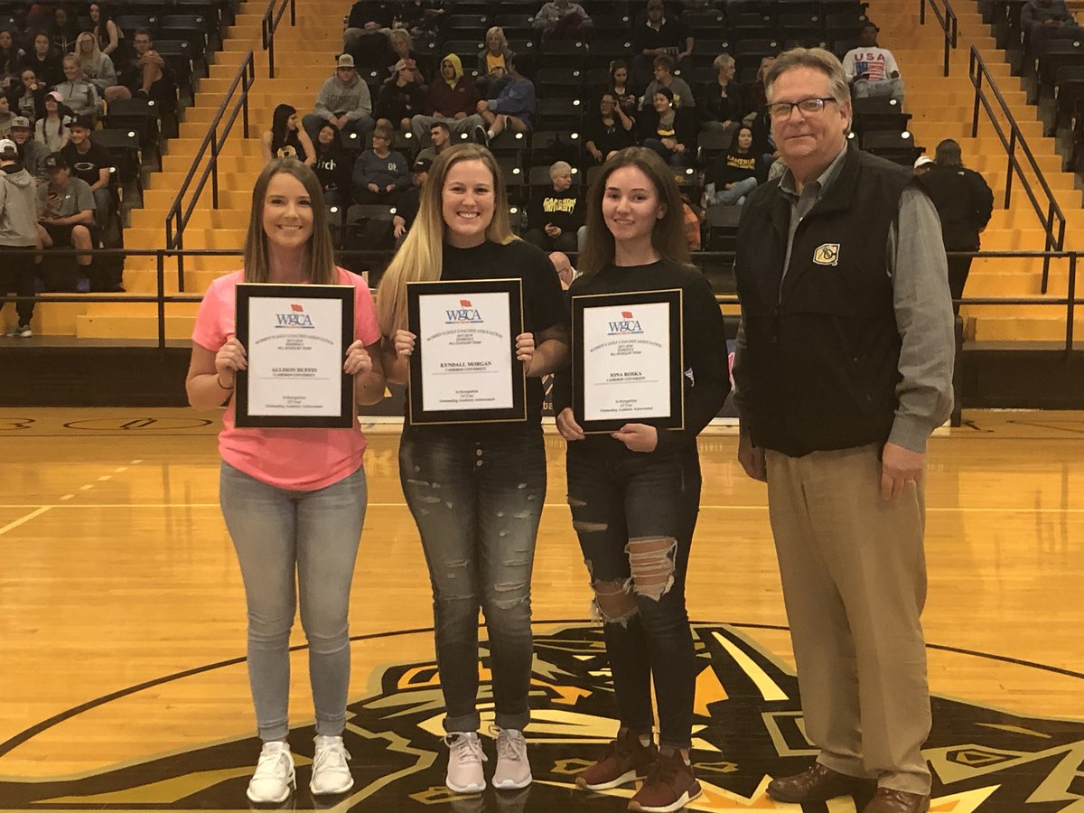AggiesWGOLF's tweet photo. Congratulations to our 2017-2018 WGCA Academic All-American Scholars who were recognized during our women’s basketball halftime tonight. We are extremely proud of you @allisonduffin, @kmorggs, and @ionaroska. Thank you, @aggiesAD for presenting the plaques. https://t.co/oxsxsslEff