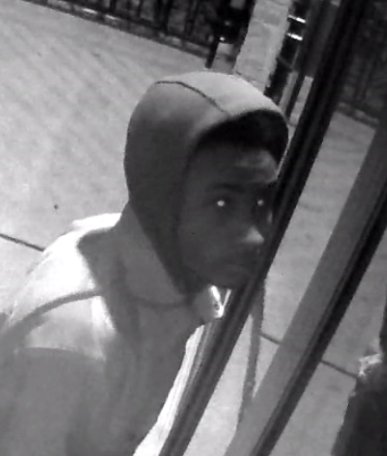 MilwaukeePolice's tweet photo. The suspect quickly looks around until the audible alarm sounds and the suspect flees through the point of entry.

Please see the attached photos and contact the Robbery Division at 414-935-7360 with any information. https://t.co/U6VxbK5mNu
