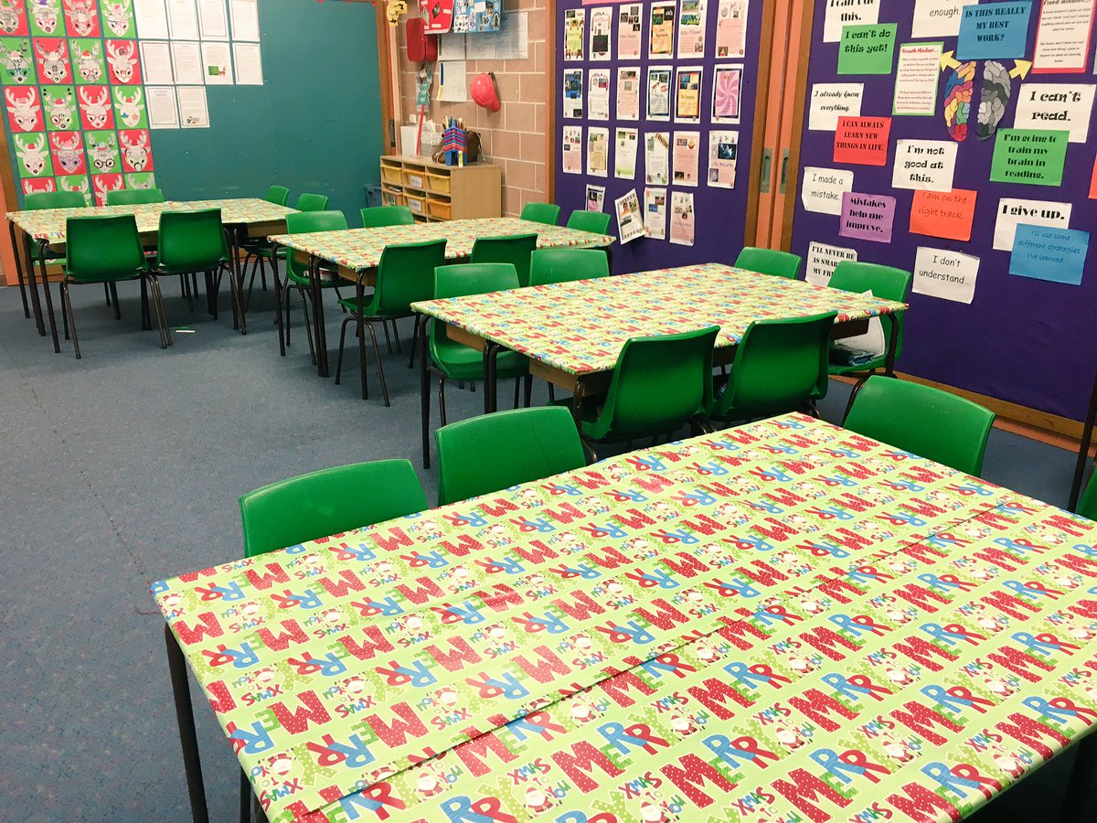 Elf on the shelf - Day 2: Surprise! Elfy wrapped our desks in wrapping paper! 🎅🏽🎄💝😂 <a href="/BangorPS/">bangor_ps</a>