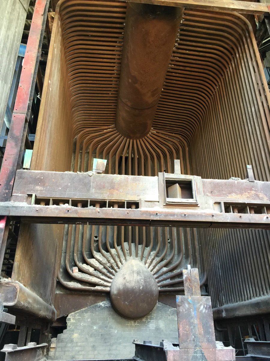 BeyondBuggirl's tweet photo. The inside of a boiler after the removal of cladding, bricks and other steel. Stunning! The UNE Boilerhouse remediation is progressing perfectly, and I love watching these structures emerge. @UniNewEngland @Create_NSW #unediscovery #ilovemyjob https://t.co/QrOiPsznh5