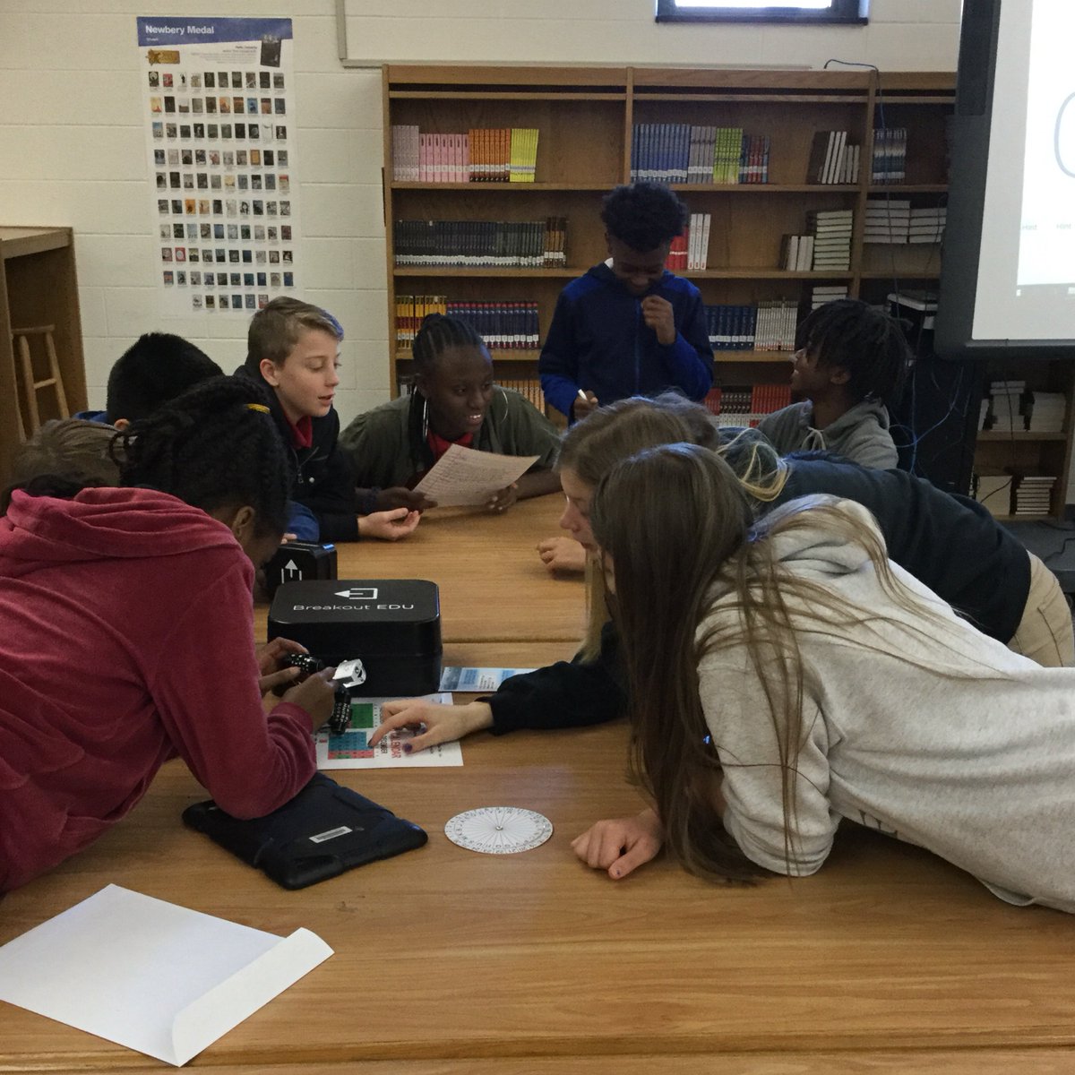 DCMSMediaCenter's tweet image. Today, Ms. Hammond’s classes were challenged by escape room game kits to solve puzzles in order to unlock boxes.  The keys to success are communication, collaboration, critical thinking, &amp;amp; creativity!  #RHSDLibraries  #ThankfulForSchoolLibraries  #BreakoutEDU  #StudentEngagement