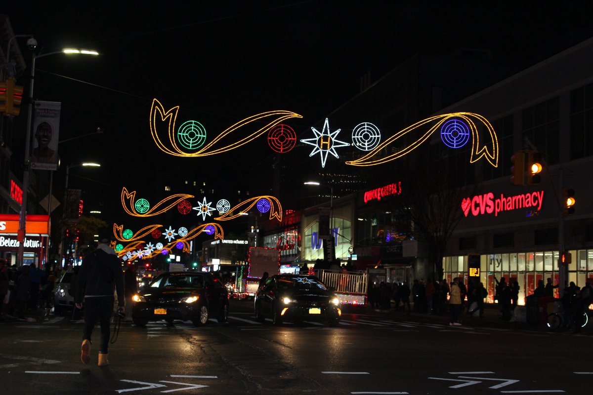 ToursHarlem's tweet photo. A little ahead of the Rockefeller Tree Lighting, but Harlem flipped the lights on this evening and the holiday season uptown has officially begun! Happy Holidays! @125thstreetbid @galeabrewer @BillPerkinsNYC https://t.co/WUEUoUYmON
