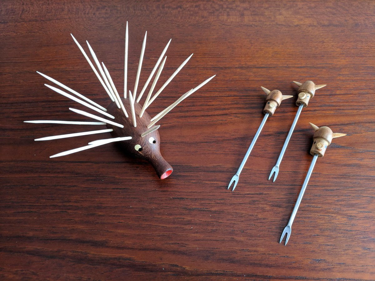 Danish teak hedgehog toothpick holder and viking cocktail picks #danishmodern #midcenturymodern #midcentury #midcenturydining #vintage #etsyshop #etsyvintage #etsysellers
