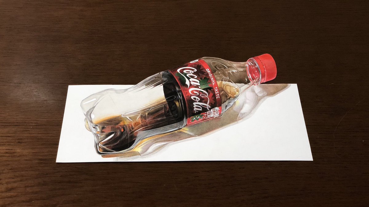 紙にコーラ置いただけやん 色鉛筆で書かれたコーラのイラストがマジで本物にしか見えなくてすごい Togetter