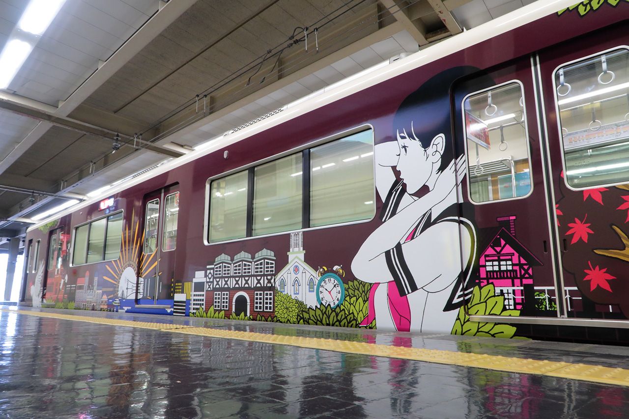 阪急電鉄 公式 土曜日からリニューアルしたラッピング列車 神戸線を走る中村佑介さんのイラストは 中村さんのイラストの特徴のひとつである女の子が向かって右側に描かれており その子を中心に写真を撮りたくなってしまいますよね ラッピング 阪急電鉄 公式 土曜日からリニューアルしたラッピング列車 神戸線を走る中村佑介さんのイラストは 中村さんのイラストの特徴のひとつである女の子が向かって右側に描かれており その子を中心に写真を撮りたくなってしまいますよね ラッピング