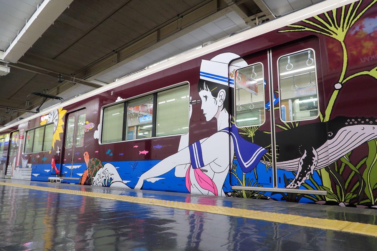 阪急電鉄 公式 土曜日からリニューアルしたラッピング列車 神戸線を走る中村佑介さんのイラストは 中村さんのイラストの特徴のひとつである女の子が向かって右側に描かれており その子を中心に写真を撮りたくなってしまいますよね ラッピング