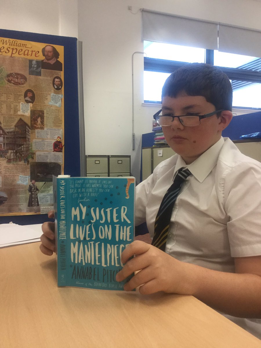 SFLLarkhall's tweet image. Nathan enjoying My Sister Lives on the Mantlepiece. #BookWeekScot, @APitcherAuthor