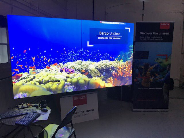 FUSIONspaces's tweet photo. Michael is attending the @Barco open house event in London today and tomorrow. He’s taken a corner sample of our #VisionWall frame to show a client. #UniSee #Barco #Technology https://t.co/DHkvI7fUhe