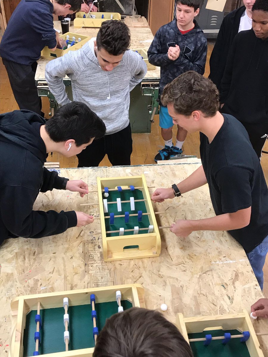 HauppaugeTechEd's tweet photo. HHS Technology Education students in Materials Processing compete in a foosball tournament with the tables they worked to create from scratch in class. Players were made on the CNC router and the ball was 3D printed. #weloveteched #foosballislife https://t.co/LBygZComL3