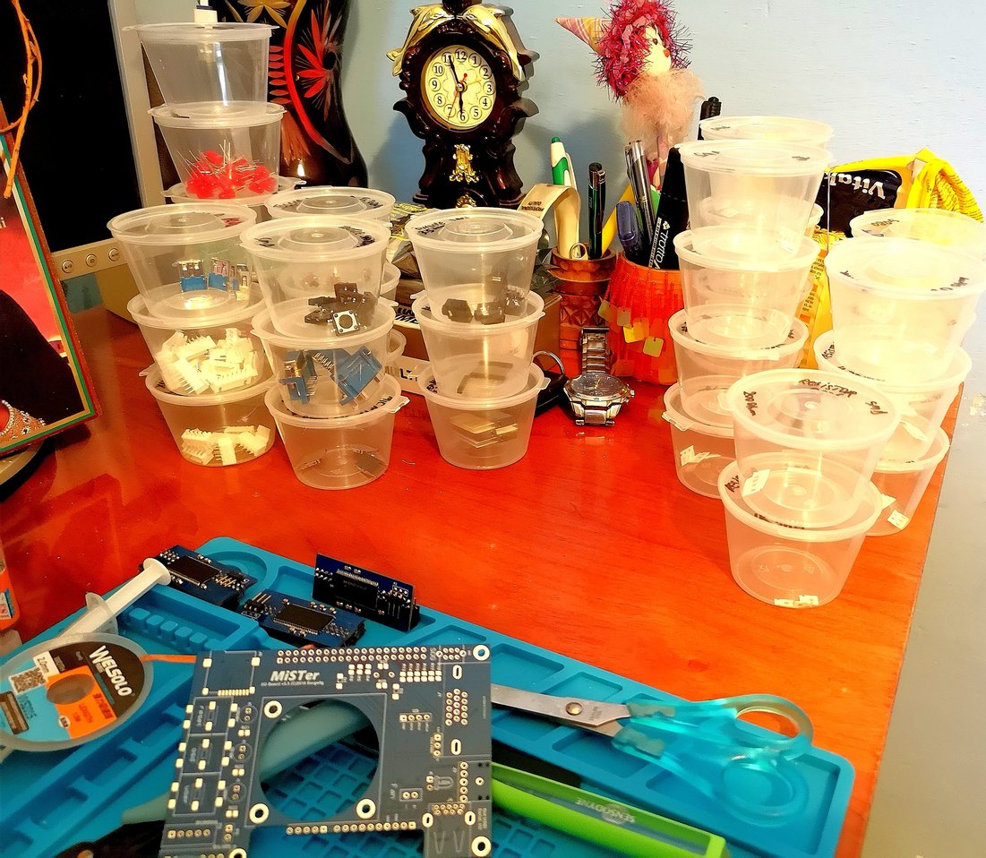 djAlexUnderBase's tweet photo. My inspiration about how to organize the #IOboard #MiSTer parts came after i've watched the @Tinkerplunk assembly video , insted of his plastic boxes i've used some plastic #pizza sauce boxes 🙈 https://t.co/ut2ApXVnPk