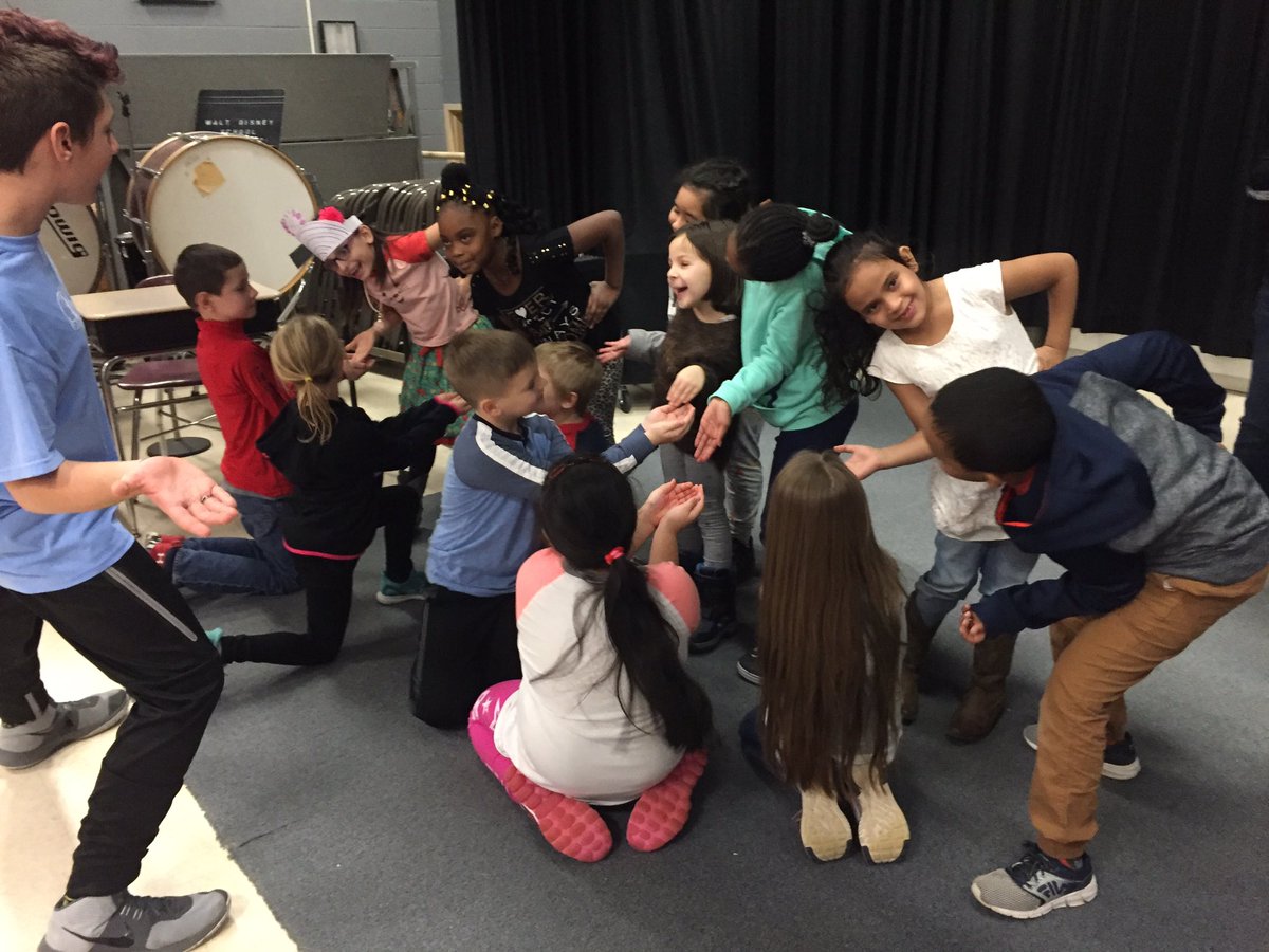 Mrs_Scarpulla's tweet photo. Acting out tableaus - frozen scenes, with the cast of Cinderella!  Student actors teaching younger students AND staff something new is so empowering!!!#Scarpulla2ndGrade #GCPride #gcartsined https://t.co/AERau4GVZA
