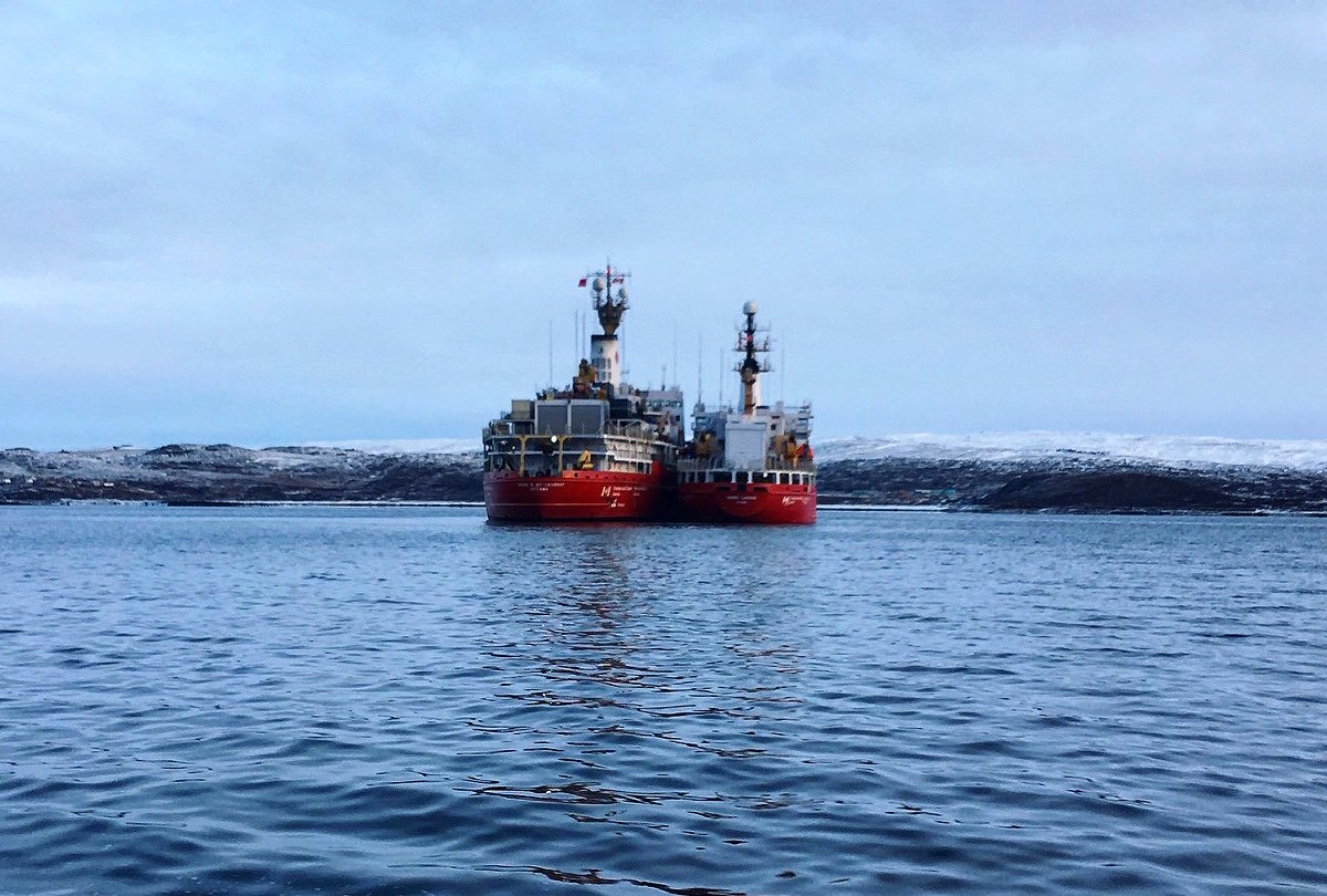 CoastGuardCAN's tweet photo. Fill ‘er up! CCGS Henry Larsen was seen transferring fuel to the CCGS Louis S. St-Laurent outside of #Iqaluit earlier this month. This fuel is essential to ensure ongoing operations during the #Arctic season. #SeaTheRed https://t.co/MZ7Ogmhcai