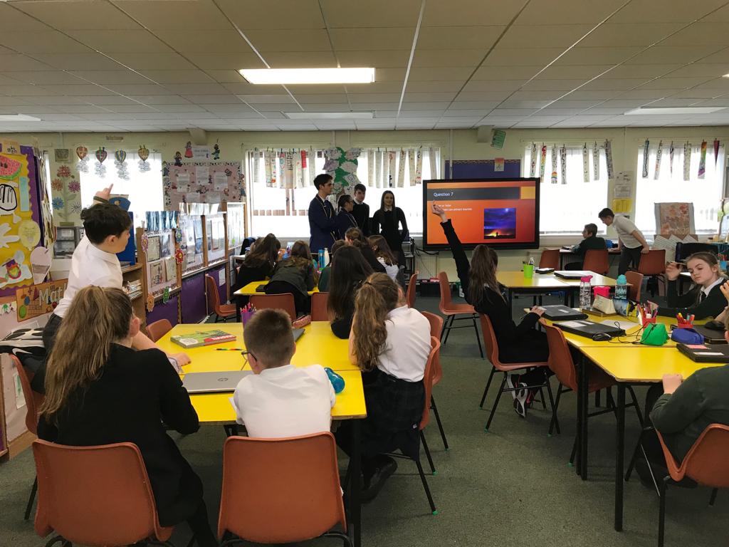 StPatricksTroon's tweet photo. S6 leaders from QMA held their first session with P7, teaching them about volcanoes with a fun fact quiz at the end. #transitition @QMAOfficial https://t.co/3dPsqpp2cj