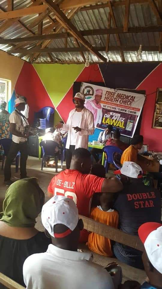 TIBmovement's tweet photo. The unstoppable AAC train steams ahead. Dr Afeez Lawal, AAC Lagos State House of Assembly candidate held a free health check in his impending constituency and brought progress to his constituents. Healthcare for our people is a great place to start; let's get #ThisLevel right. https://t.co/xSL9X1blRK