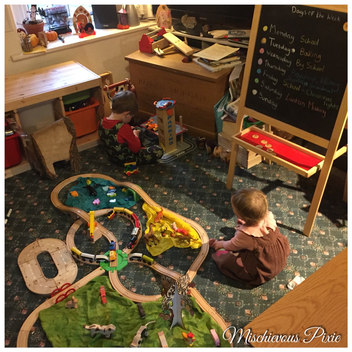 MissPixieUK's tweet photo. It blooming horrid weather here so we’ve built a city and talking about our topic this week which is the days of the week. #mischievouspixie #rainydayfun #homeeducation https://t.co/zSEKKMCJmc