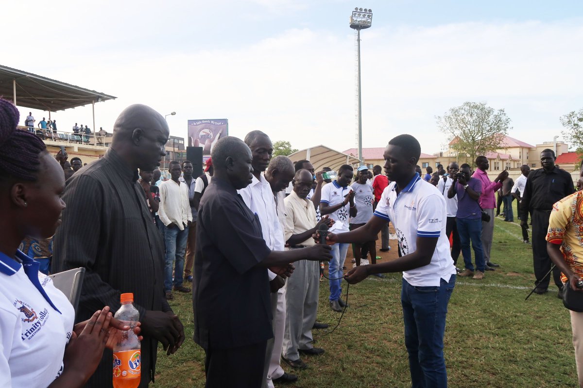 TrinityCollege's tweet photo. “We wanted to bring youth from different tribes or ethnic groups together & enable them to showcase their talents,” explains Ukuch Gabriel Ligol ’19, about his recent #ProjectsForPeace grant & goal for uniting youth in South Sudan w/ soccer. https://t.co/6lA2OiILxp #TrinityGood https://t.co/9ffHhfHUBz