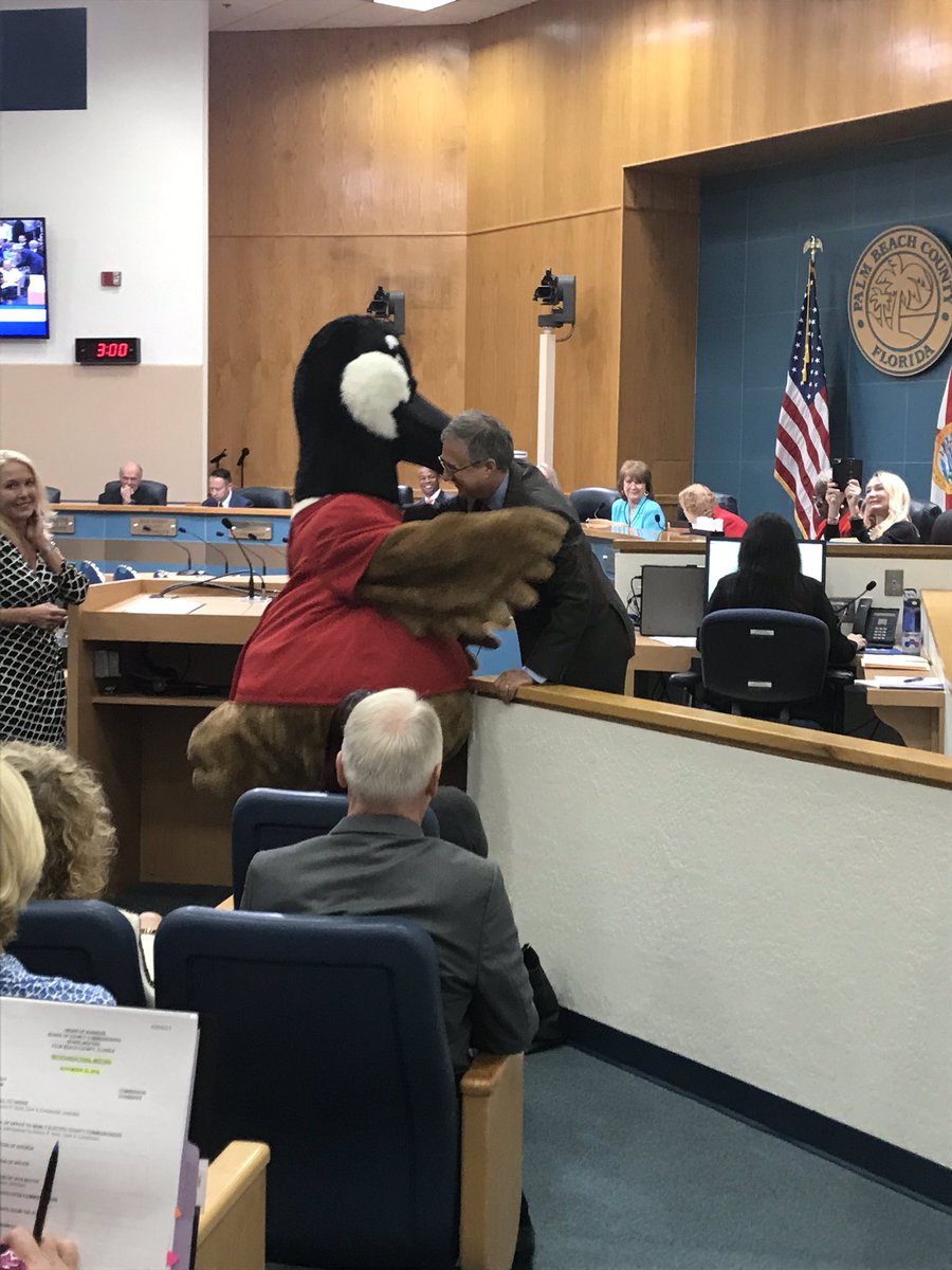 TheNameIsWatt's tweet image. Possible best picture of the day at PBC BCC. @CommAbrams hugging the mascot of arguably the best company he brought  for the county, the @Wawa bird on his final day on the board.