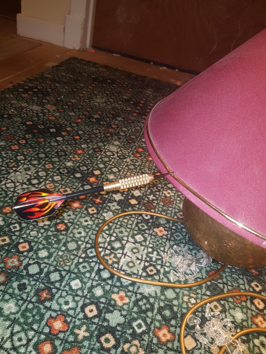 binarychris's tweet image. YOU explain this - the lamp was directly opposite the dartboard - and the dart is near the back arse of it. I'm sorry, but fuck yer physics. I'm callin the Ghostbusters.