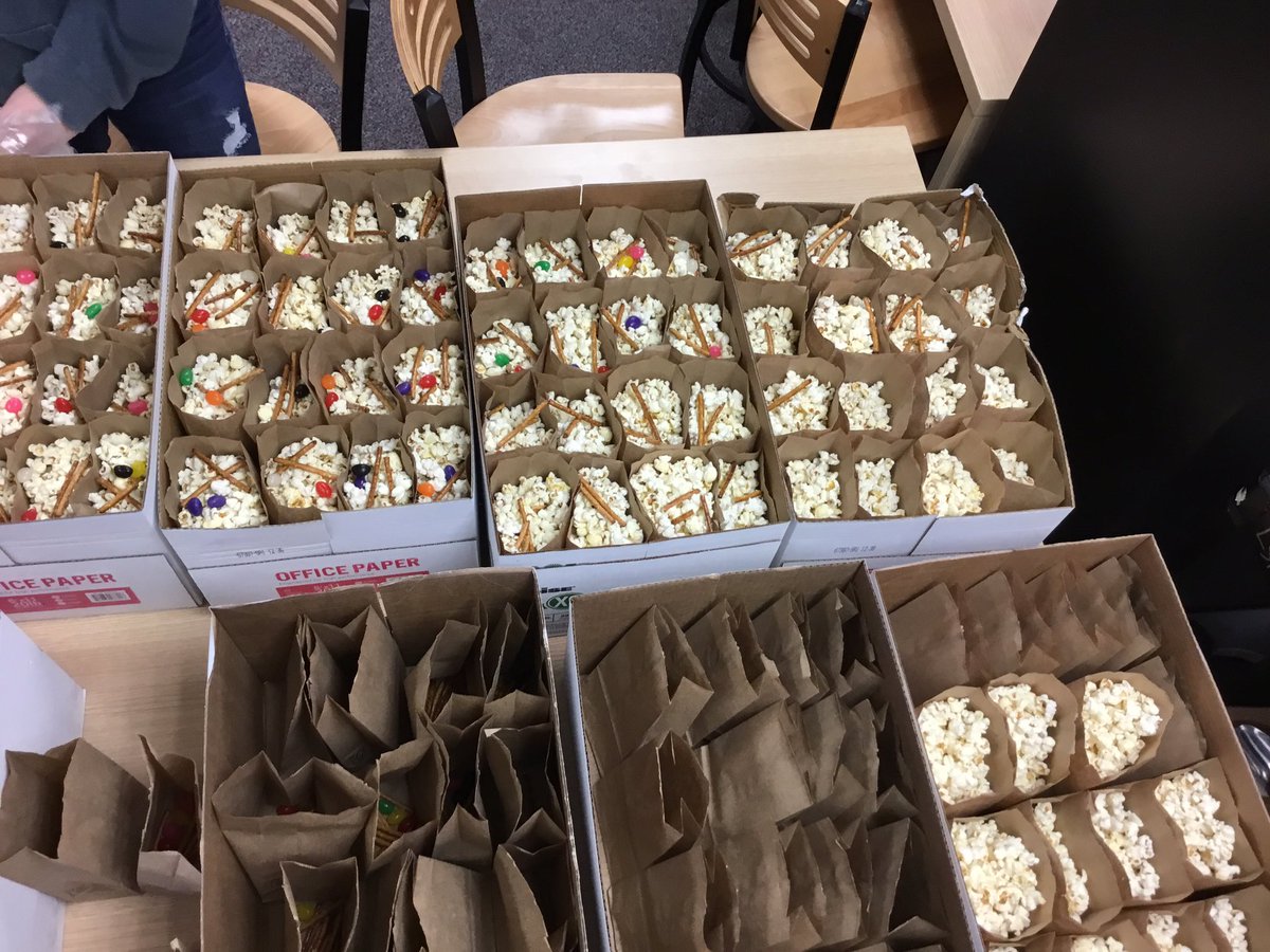 LSNLMC's tweet photo. Prepping for the Charlie Brown Thanksgiving in the #LMC during #BroncoTime this morning.  We handed out close to 200 bags of popcorn with pretzels and jelly beans. We’re thankful for an active #library at #LSN. https://t.co/HYRpai7tVa