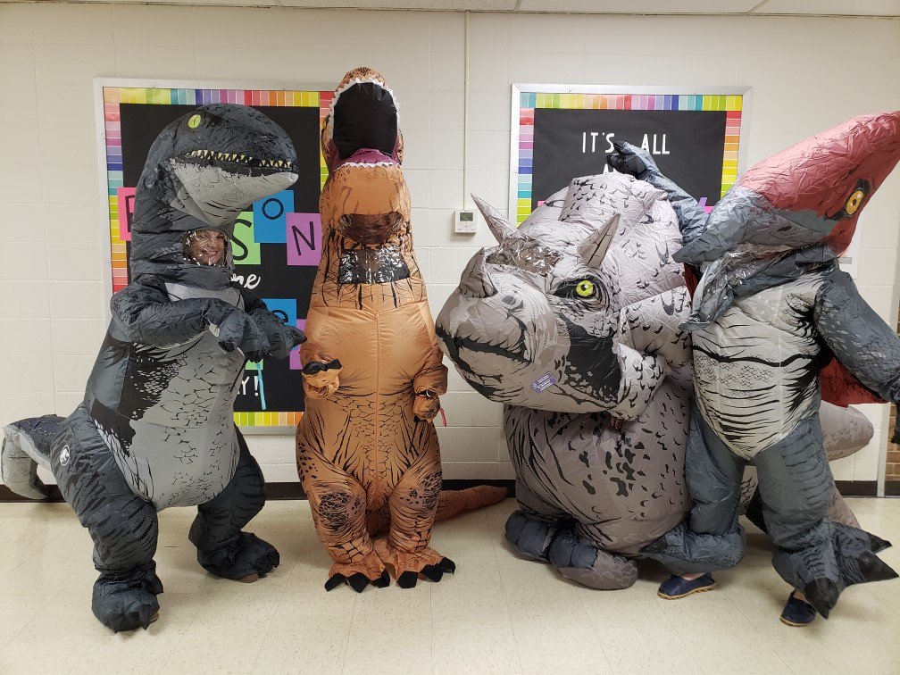 FMTFalcons's tweet photo. Our administrators are Dino-Mite!  Today we are celebrating our successful fun run and receiving pledges from all 50 states! #FMTpride #FHSDpride https://t.co/uRidhDc8H1