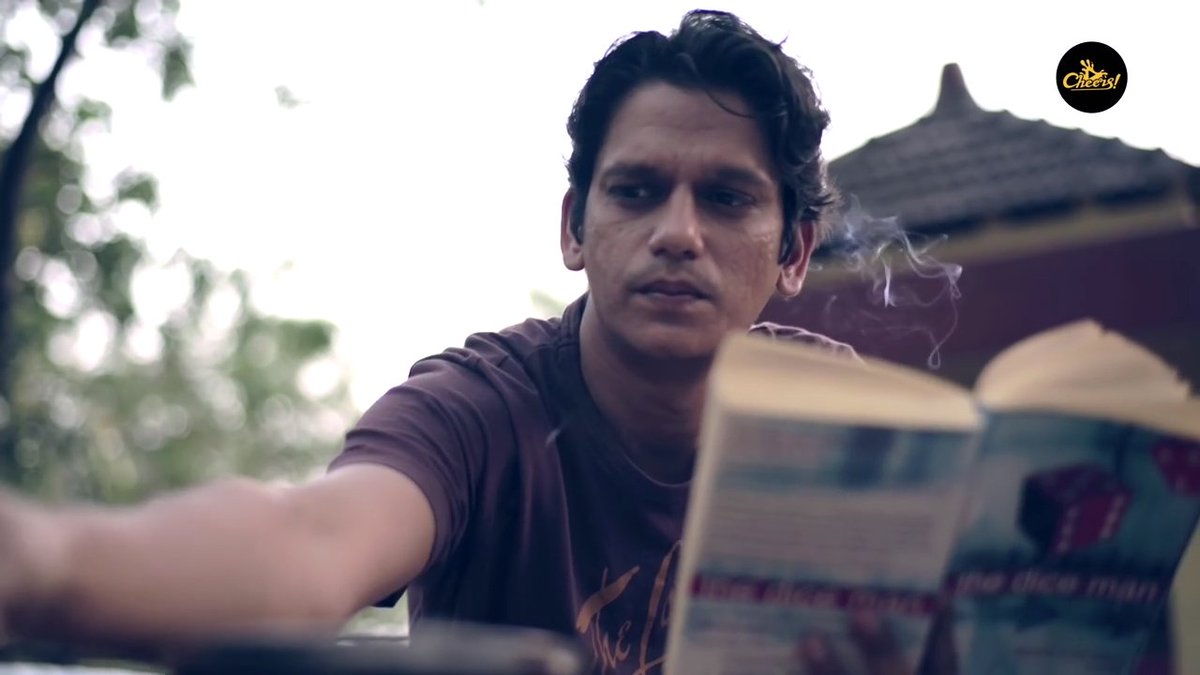 BooksInTVSeries's tweet photo. Siddharth (Vijay Varma) reads  The Dice Man (a novel published in 1971 by George Cockcroft under the pen name Luke Rhinehart) in Sumit Saxena's Cheers (Episode 1)
#BooksInWebSeries https://t.co/OF9UripqCO