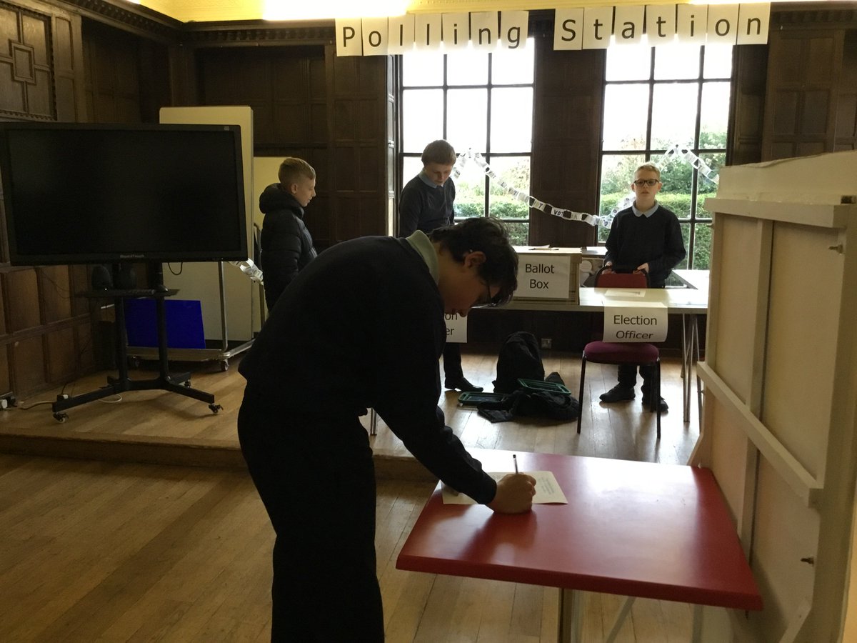 LG_School's tweet photo. The pupils took part in Pupil Voice elections today. The Election Officers made sure the polling station run smoothly and voters had their polling cards. Candidates for election delivered rousing campaign speeches to the whole school. #BritishValues #DemocracyMatters https://t.co/FSoW6cMC0B