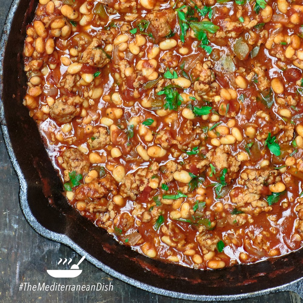 This delicious, comforting Italian sausage and white bean #stew by <a href="/themeddish/">TheMediterraneanDish</a> is just the thing you need to warm you up on a chilly day 🍲 A wonderfully easy and satisfying fall meal 🍂 Discover the #recipe at this link: bit.ly/2RNqzrA