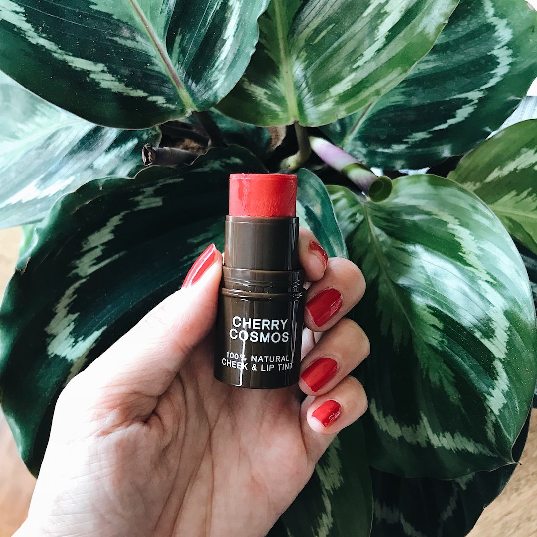 Our Cherry Cosmos Cheek &amp; Lip Tint is a stunning classic red for your cheeks, lips and eyes! Best of all, no insects were harmed in the making of this red. Cherry Cosmos's vibrant red is powered by beetroot and pink carrots + fruity reds like cherry powder &amp; pomegranate extract.