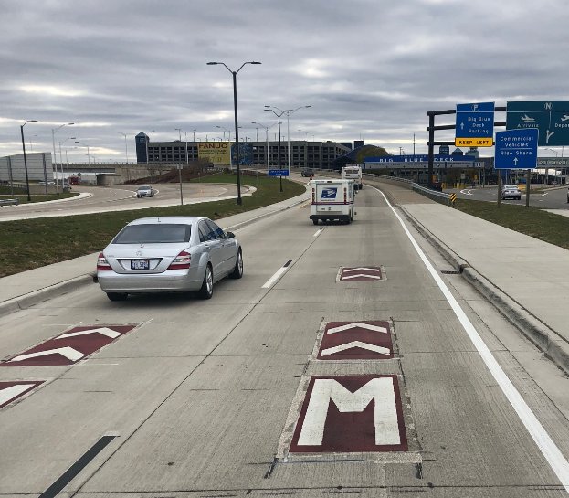 Dtw Airport On Twitter The Colorful Road Inlays Pictured Will Help Direct You To The Appropriate Terminal Or The Car Rental Area The Burgundy Inlays Lead You To The Mcnamara Terminal The