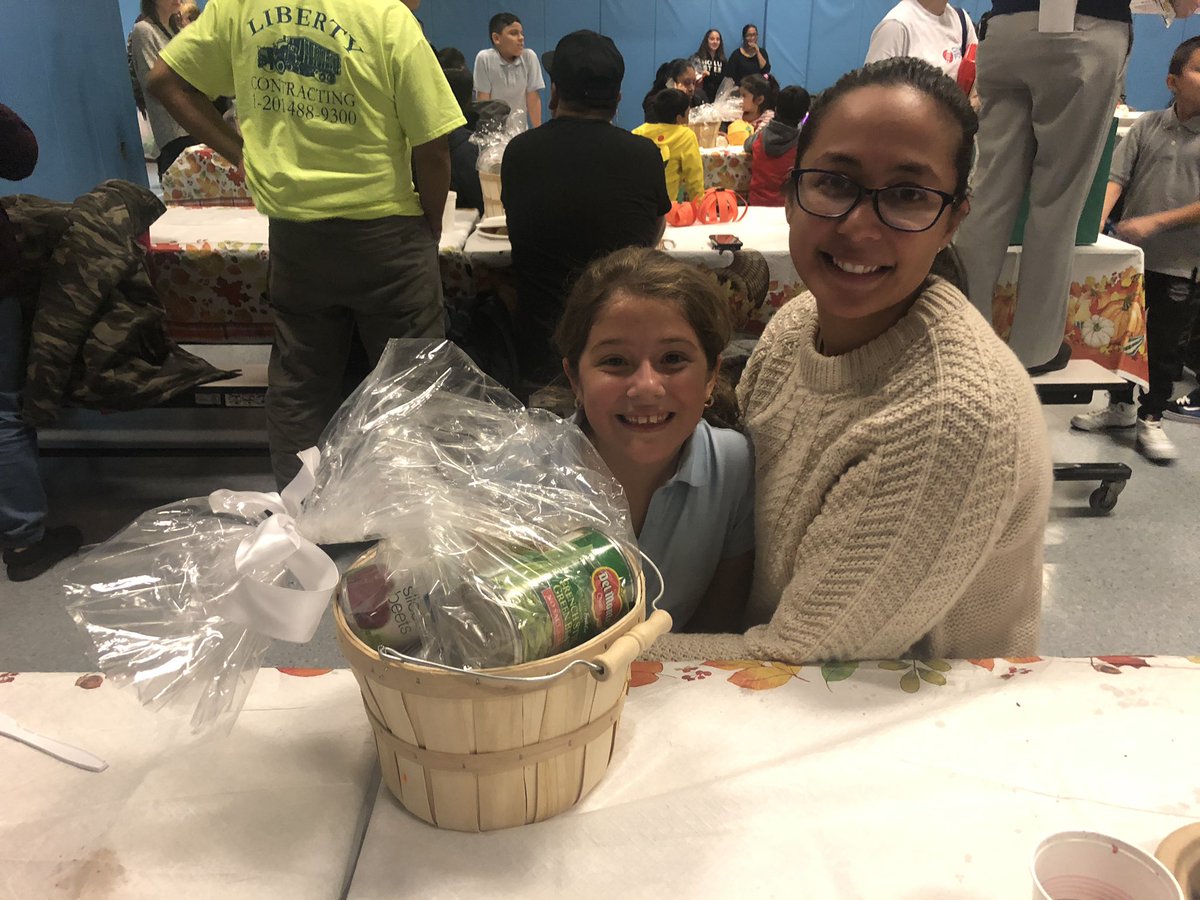 PS142M's tweet photo. Congrats to all of the families who won our Harvest Feast baskets tonight! Thank you @RBC for your generous donations for the baskets filled with canned goods and other amazing goodies! #ps142m #nycschools #whycfk #harvestfeast #thanksgiving https://t.co/lauhtgSrDm