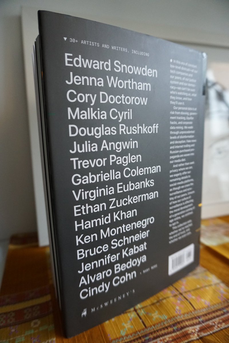 A photo of the back of The End of Trust, listing the included authors: <br />
Edward Snowden<br />
Jenna Wortham<br />
Cory Doctorow<br />
Malkia Cyril<br />
Douglas Rushkoff<br />
Julia Angwin<br />
Trevor Paglen<br />
Gabriella Coleman<br />
Virginia Eubanks<br />
Ethan Zuckerman<br />
Hamid Khan<br />
Ken Montenegro<br />
Bruce Schneier<br />
Jennifer Kabat<br />
Alvaro Bedoya<br />
Cindy Cohn