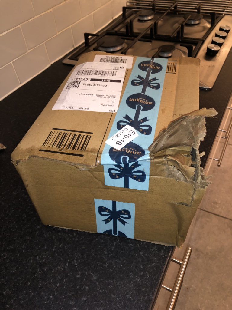 SneakyBeats82's tweet photo. Absolutely #Outraged at @AmazonUK its pissing down with rain and your arsehole #Delivery driver has left my package out in the rain like this https://t.co/PN0p0uqsJK