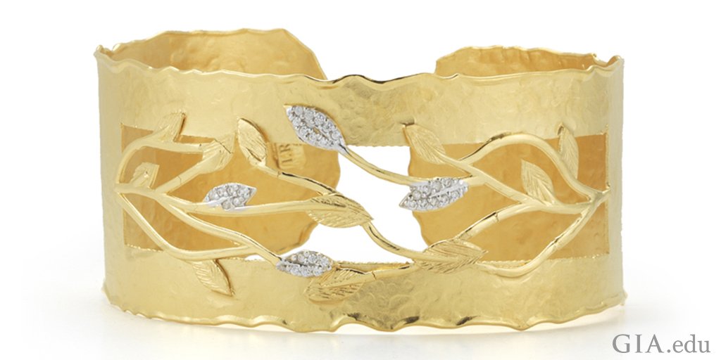 GIAnews's tweet photo. Add some feminine edge to your #jewelry style this fall with a #bracelet like this 14K gold cuff. Its matte and hammer-finished vine motif features 0.20 carats of #diamonds. Courtesy: I. Reiss https://t.co/rT03rNkyxj