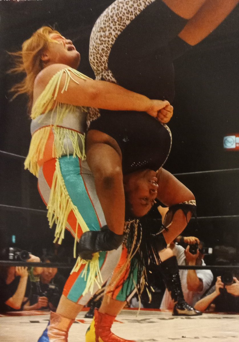 Kyoko Inoue gets Amazing Kong up for a piledriver at All Japan Pro